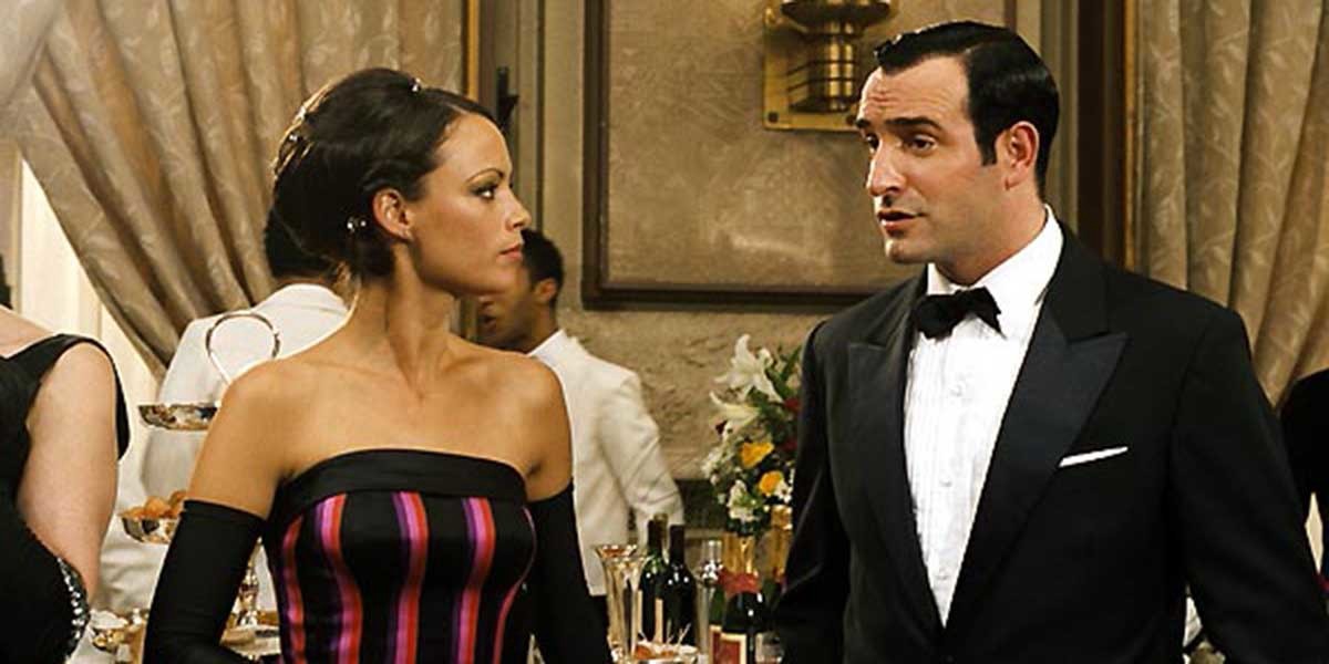 Larmina and OSS 117 attend a party in elegant evening wear