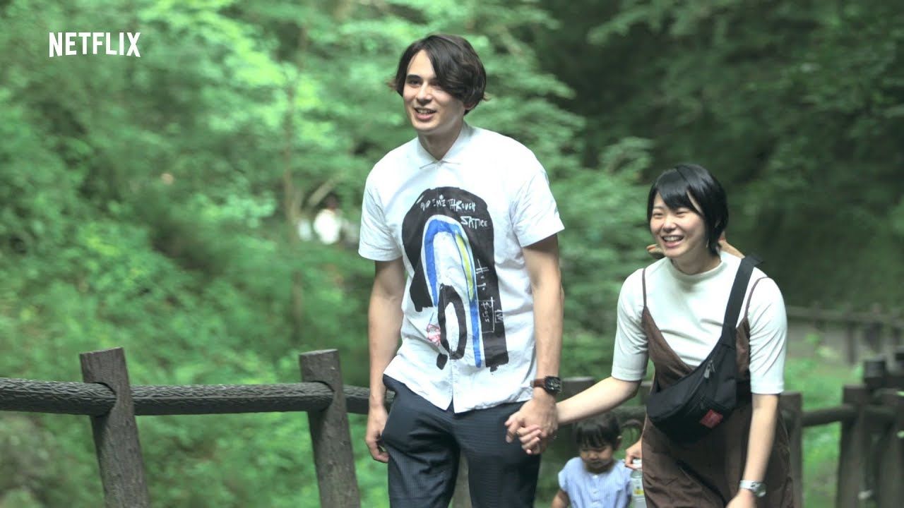 Tsubasa and Shion hold hands on a walk