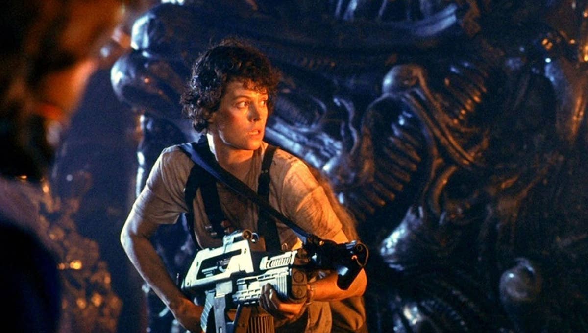 Ellen Ripley (Sigourney Weaver) holding a gun