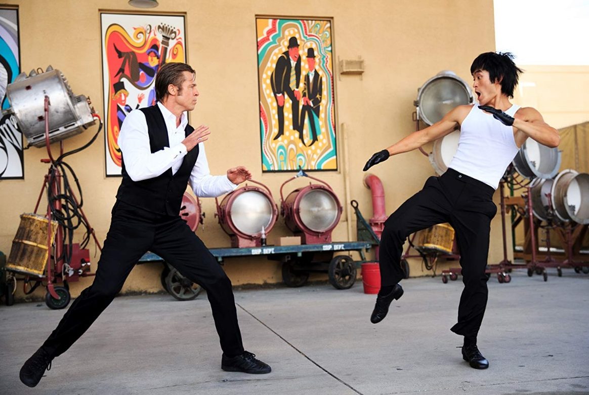 Cliff (Brad Pitt) faces off against Bruce Lee (Mike Moh).