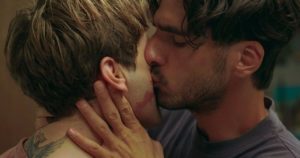 Matthias kisses Maxime gently on the cheek.