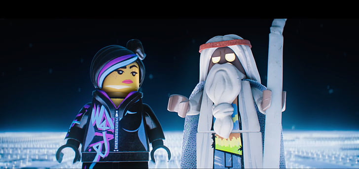 A still featuring Vitruvius and WyldStyle judging Emmet