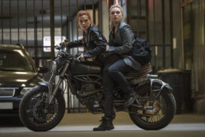 A still from "Black Widow" of Natasha and Yelena on a motorcycle