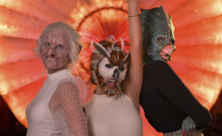 Contestant Karrisa (dressed up as a troll) pictured on the left. Contestant Gabi pictured front and center (dressed up as an owl). Contestant Bella (dressed up as a triceratops) pictured on the right. Out of the three, Karissa‘s makeup job is far less appealing visually.