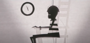 A still from the end credits of 'Candyman' featuring a shadow puppet of a boy given the electric chair