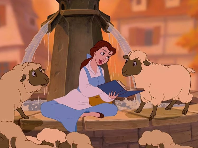 Belle reading and singing to sheep in Beauty and the Beast