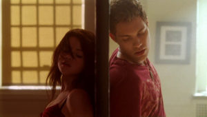 A still from 'Another Cinderella Story' of Mary and Joey dancing on opposite sides of a mirror