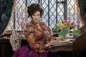 A still from 'Cinderella' (2021) of Idina Menzel as the evil stepmother