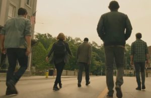 The members of the Losers Club walk outside, backs to the camera.