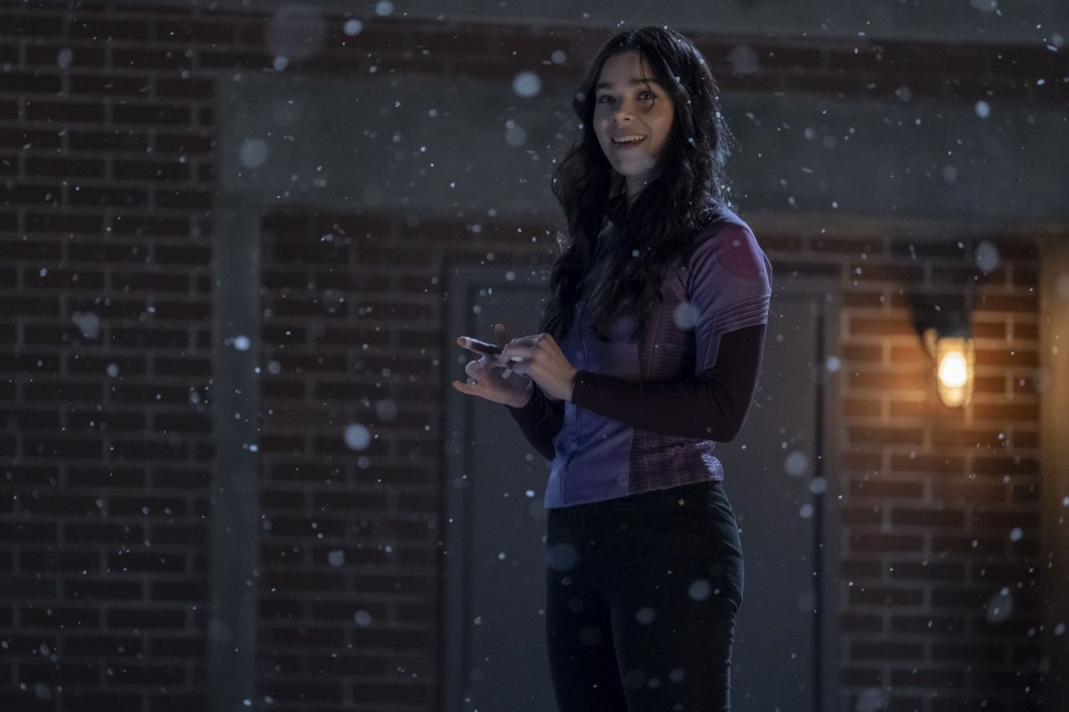 A still from Hawkeye of Kate smiling in the snow