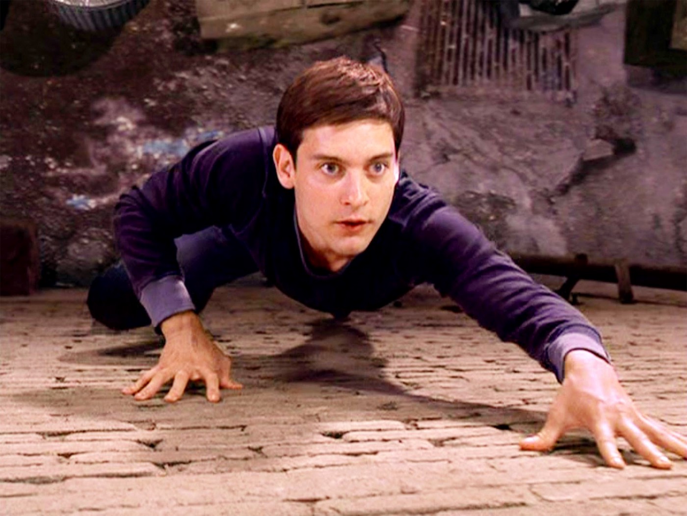 Scene of Peter Parker wall climbing