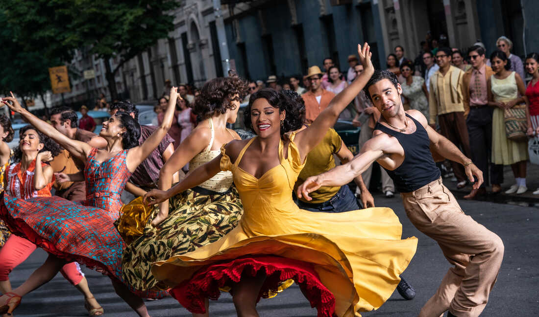 Bernardo and Anita dance in the streets during the "America" song in West Side Story (2021)