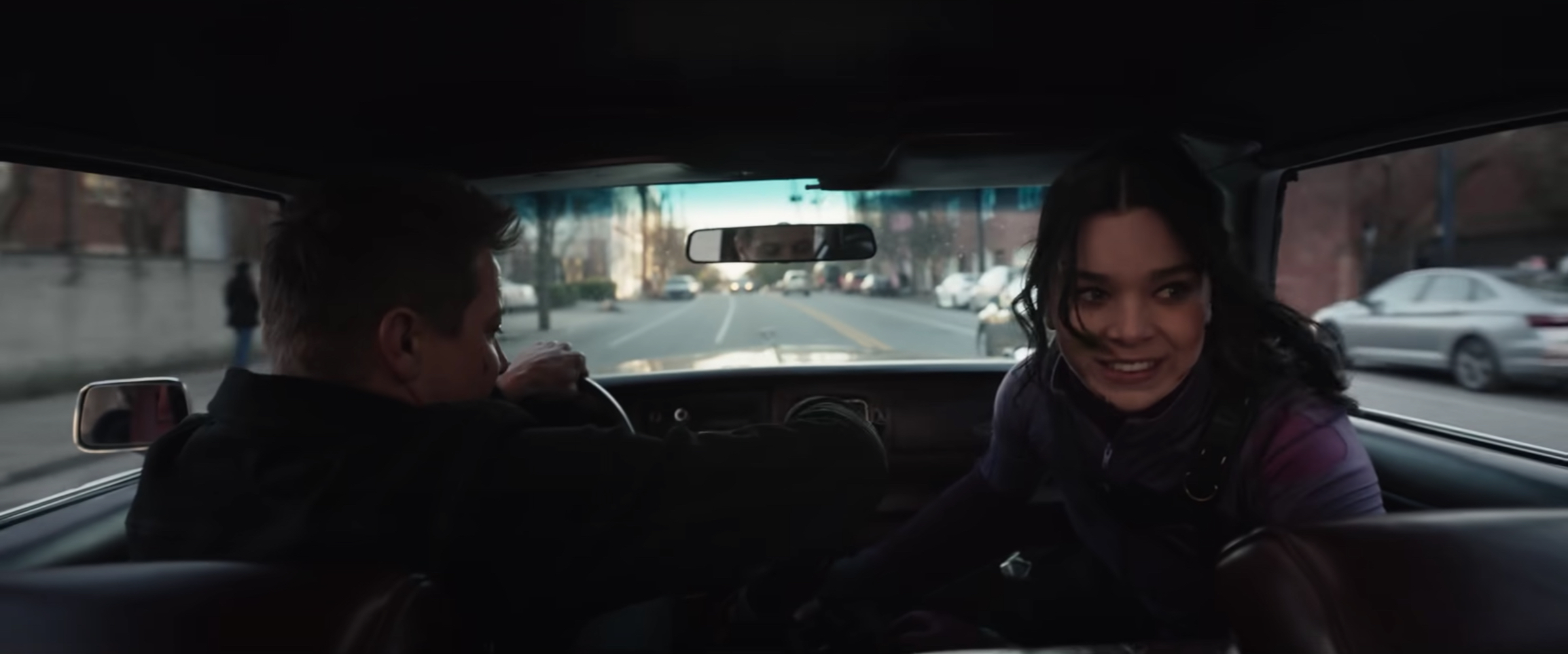 A still from Hawkeye of Clint and Kate in the car