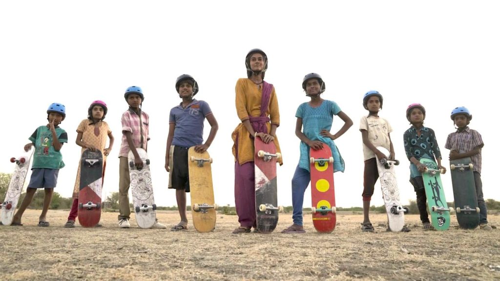 Prerna and the village kids ready to skateboard
