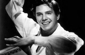 A young Desi Arnaz playing the conga