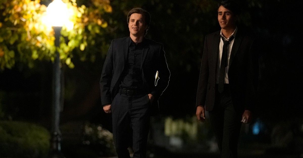 A still from Love, Victor of Victor and Benji walking down the street together at night