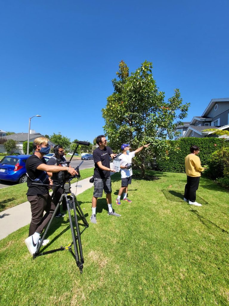 The film's cast and crew filming on set