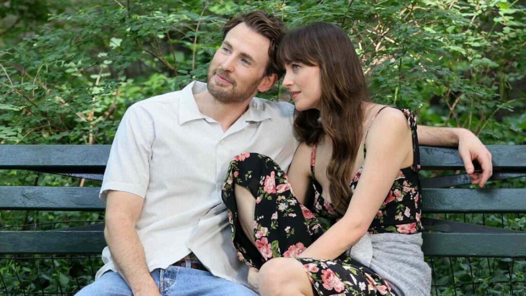John and Lucy cuddling on a park bench