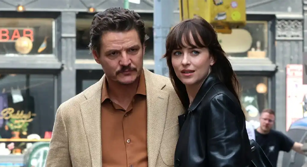Harry and Lucy walking through the city street