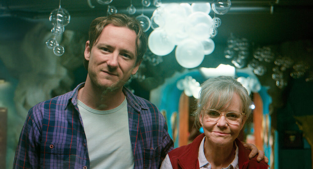 Remarkably Bright Creatures Netflix 2026, Tova (Sally Field) and Cameron (Lewis Pullman)